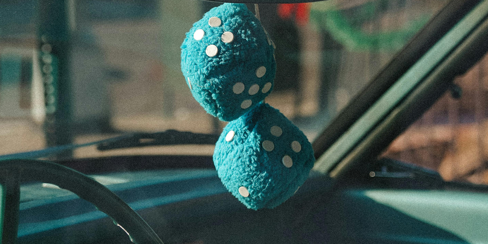 Fuzzy dice in car